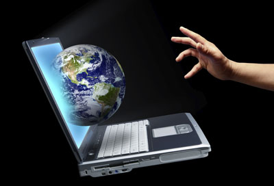 computer/globe/hand illustration