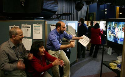 People watching rover landing coverage on TV