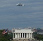 Discovery over Lincoln Memorial